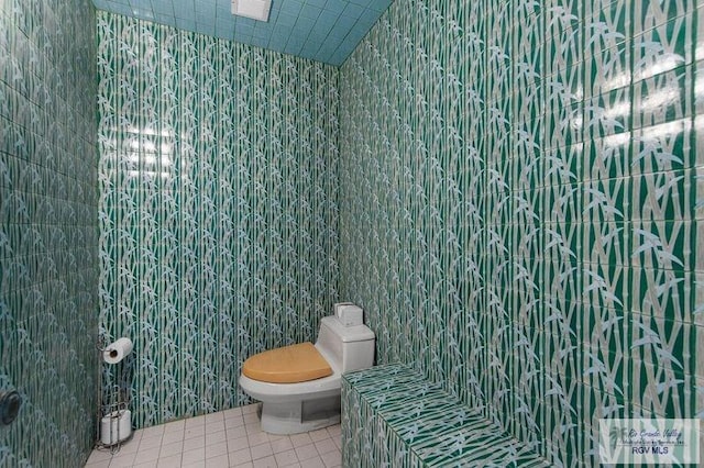 bathroom featuring tile patterned floors and toilet