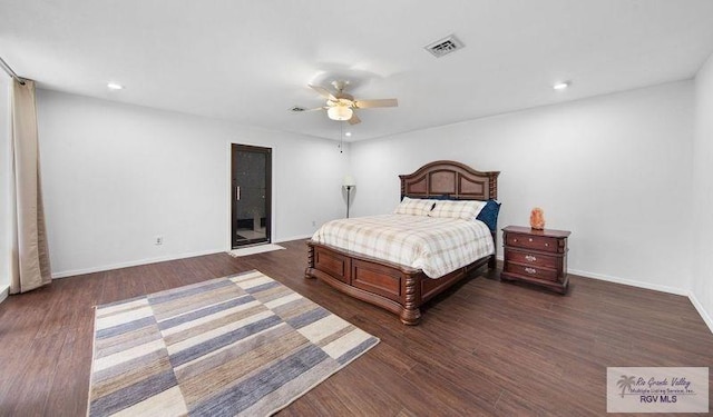 bedroom with dark wood-type flooring and ceiling fan