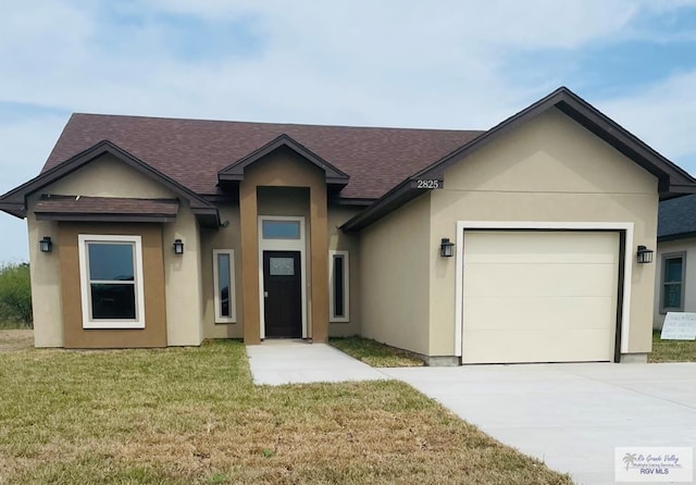 ranch-style house with concrete driveway, stucco siding, an attached garage, and a front yard