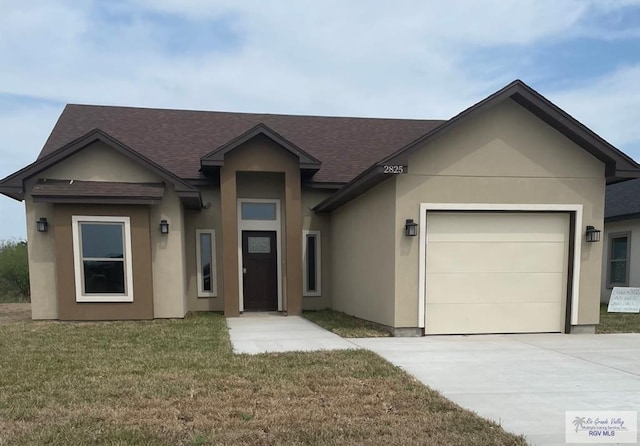 single story home featuring a garage, driveway, a front lawn, and stucco siding