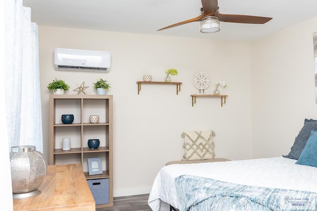 bedroom featuring ceiling fan, dark hardwood / wood-style flooring, and an AC wall unit