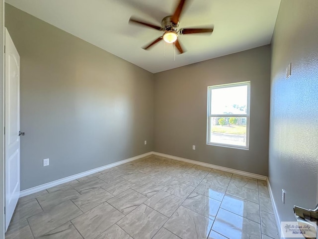 spare room featuring ceiling fan