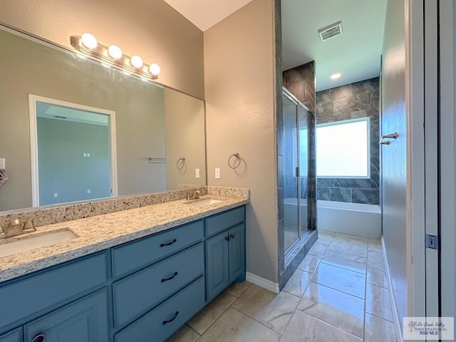 bathroom with vanity and walk in shower