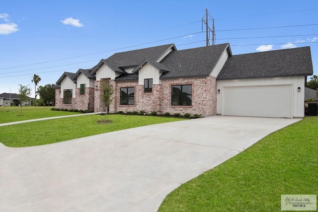 french country home with roof with shingles, board and batten siding, a front yard, and an attached garage