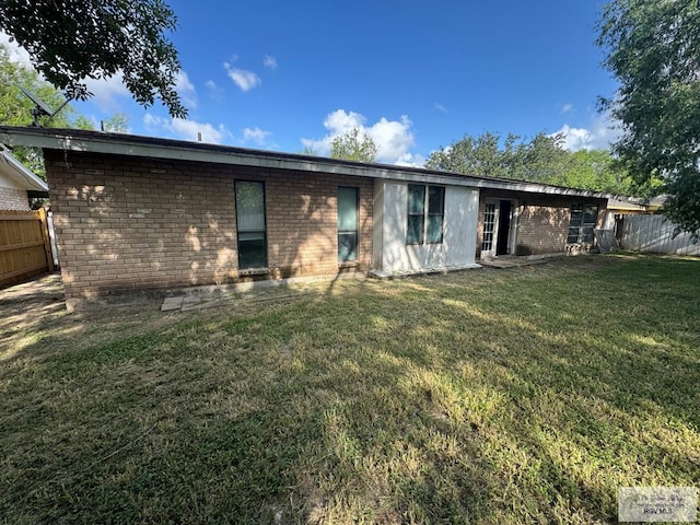 20 Casa Linda Unit 20, Brownsville, TX 78526 - back of house with brick siding