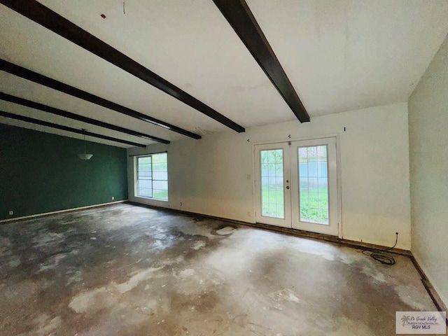 20 Casa Linda Unit 20, Brownsville, TX 78526 - unfurnished room with concrete flooring, beam ceiling, and french doors