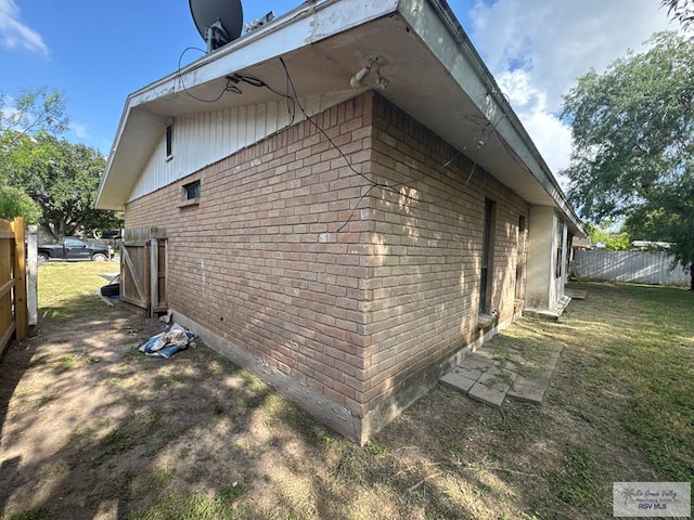 20 Casa Linda Unit 20, Brownsville, TX 78526 - view of property exterior with brick siding