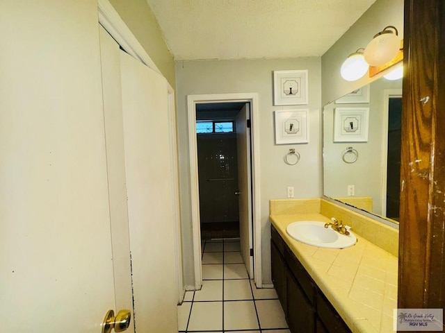 20 Casa Linda Unit 20, Brownsville, TX 78526 - bathroom with vanity and tile patterned floors