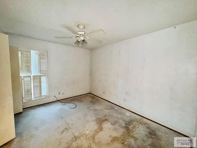 20 Casa Linda Unit 20, Brownsville, TX 78526 - unfurnished room with unfinished concrete flooring and a ceiling fan
