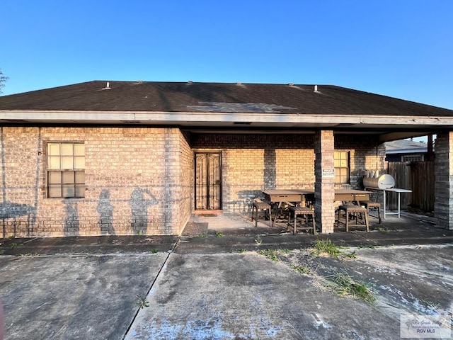 1822 Nasa, Brownsville, TX 78521 - full bathroom featuring toilet and curtained shower