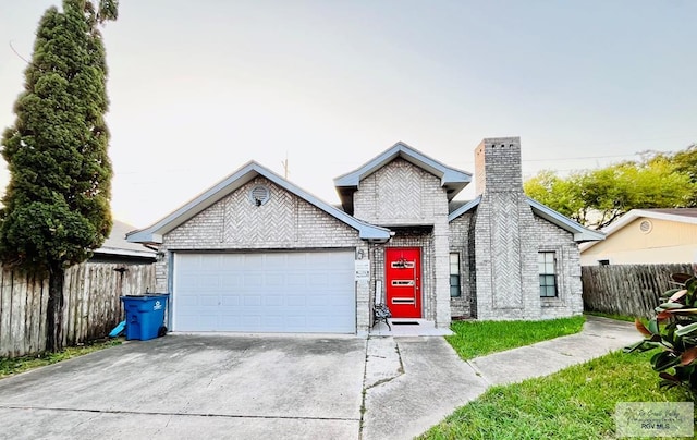 view of front of property with a garage