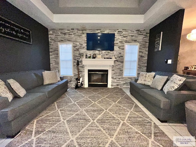 1822 Nasa, Brownsville, TX 78521 - living area featuring a raised ceiling and a glass covered fireplace