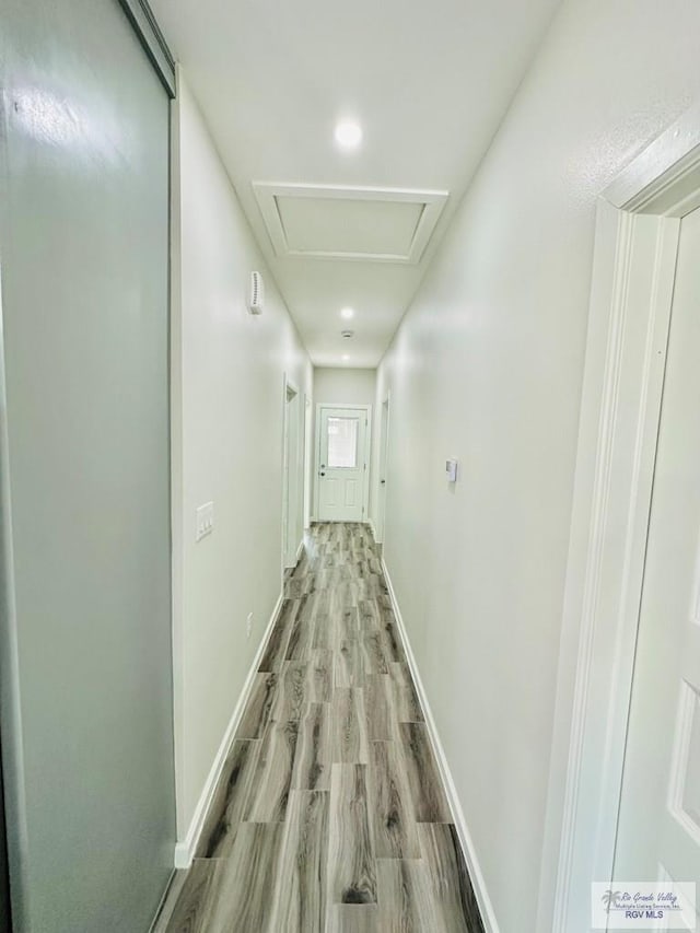 hallway featuring light hardwood / wood-style flooring