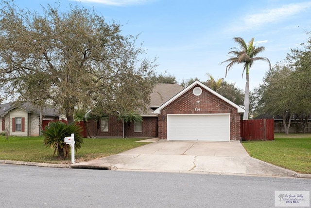 single story home with a garage, brick siding, fence, driveway, and a front lawn