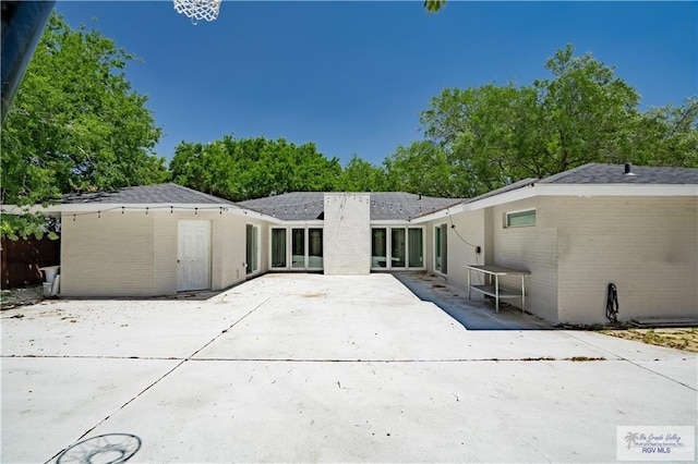 rear view of house featuring a patio area