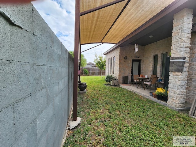 view of yard with a patio area