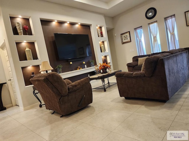 living room featuring light tile patterned flooring