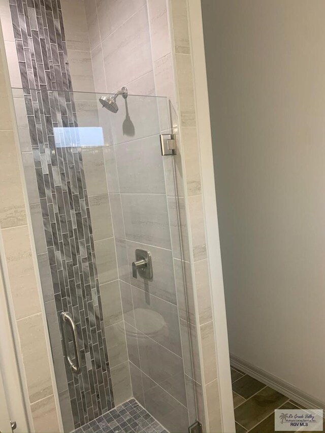 bathroom featuring walk in shower