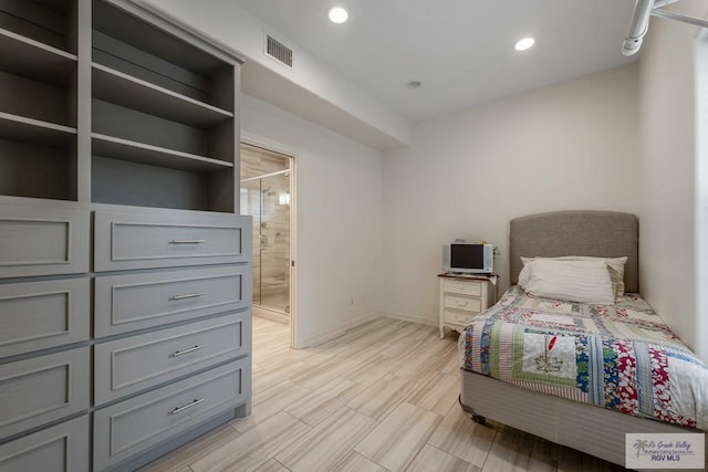 bedroom with connected bathroom