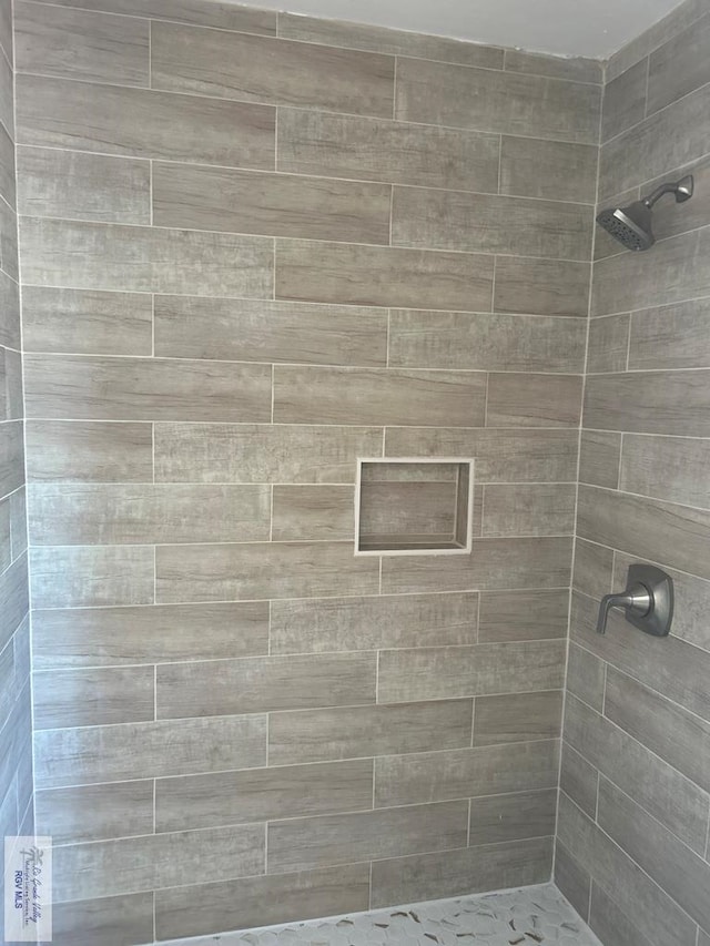 212 Morelos Ave, Rancho Viejo, TX 78575 - full bath featuring a stall shower