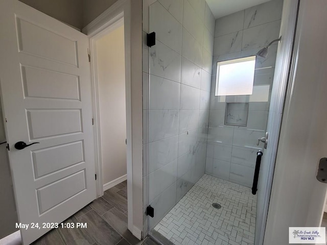 bathroom featuring a stall shower