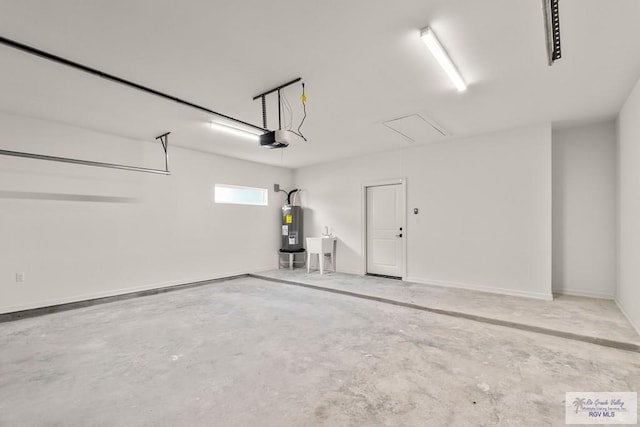 garage with water heater and a garage door opener