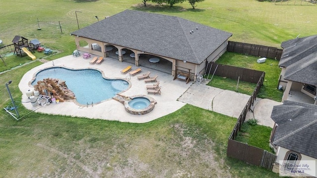 450 Bobcat St, San Benito, TX 78586 - view of swimming pool with a patio and an in-ground hot tub