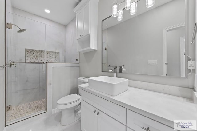 32722 Jorge St, Los Fresnos, TX 78566 - bathroom with a shower stall, vanity, and recessed lighting
