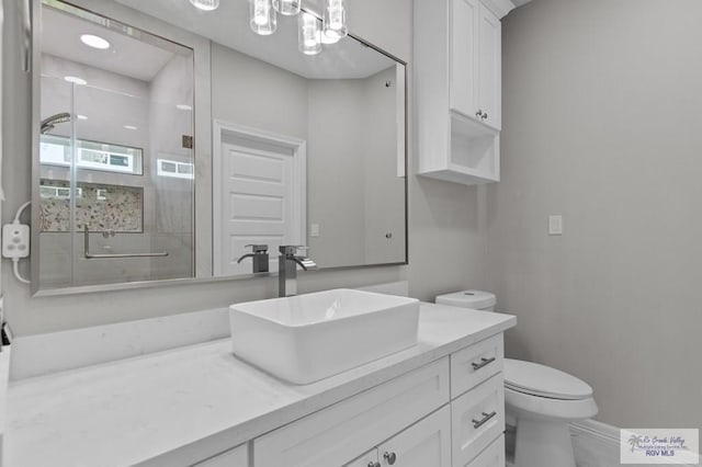 32722 Jorge St, Los Fresnos, TX 78566 - bathroom featuring vanity and a shower stall