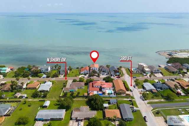 1810 N Shore Dr, Port Isabel, TX 78578 - aerial view of residential area with a nearby body of water