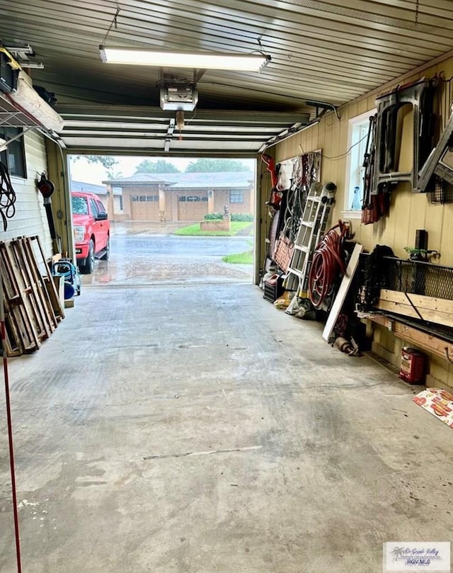 garage featuring a garage door opener