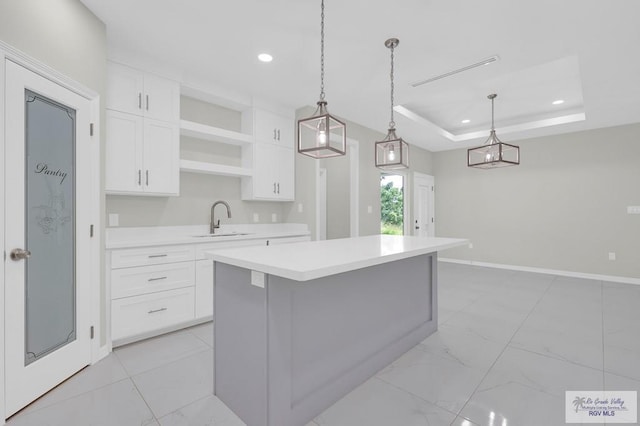 4698 Kalinga Ln, Brownsville, TX 78521 - kitchen featuring a sink, light countertops, white cabinetry, and recessed lighting