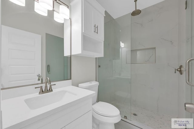 4698 Kalinga Ln, Brownsville, TX 78521 - full bathroom with a marble finish shower, vanity, and toilet