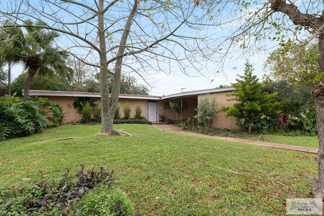 exterior space with a front lawn