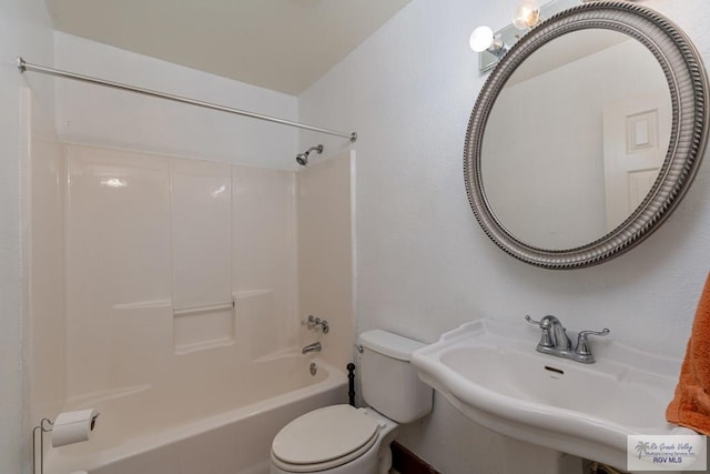 full bathroom featuring bathtub / shower combination, toilet, and sink