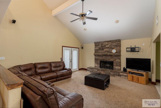 carpeted living room featuring ceiling fan, a fireplace, high vaulted ceiling, and french doors