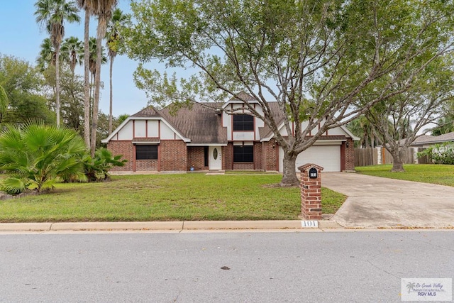 view of front facade with a garage and a front yard