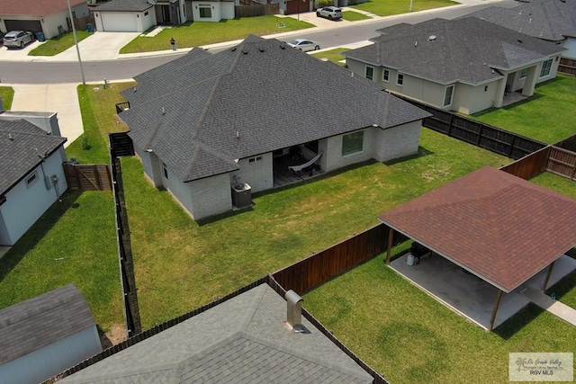 birds eye view of property with a residential view