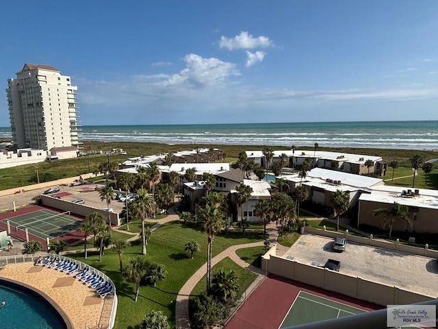 bird's eye view featuring a water view and a view of the beach