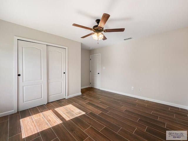 23756 Richmond Cir, Harlingen, TX 78552 - unfurnished bedroom featuring dark wood finished floors, a closet, and ceiling fan