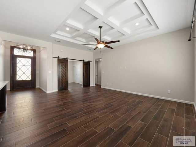 23756 Richmond Cir, Harlingen, TX 78552 - unfurnished bedroom featuring a barn door, coffered ceiling, beamed ceiling, dark wood-style floors, and recessed lighting