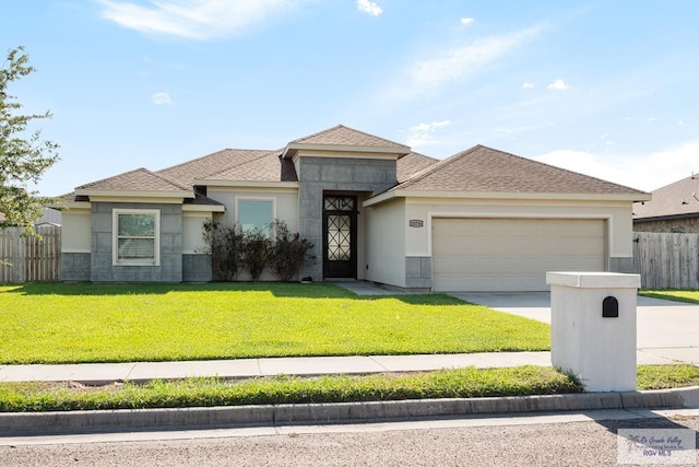 23756 Richmond Cir, Harlingen, TX 78552 - view of front of house featuring a garage, concrete driveway, and roof with shingles