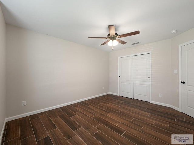 23756 Richmond Cir, Harlingen, TX 78552 - unfurnished bedroom with wood tiled floors, a closet, and ceiling fan