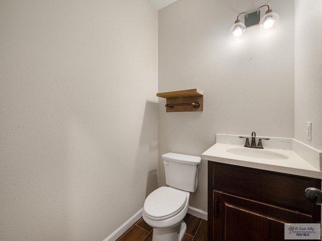 23756 Richmond Cir, Harlingen, TX 78552 - bathroom with vanity and wood finished floors