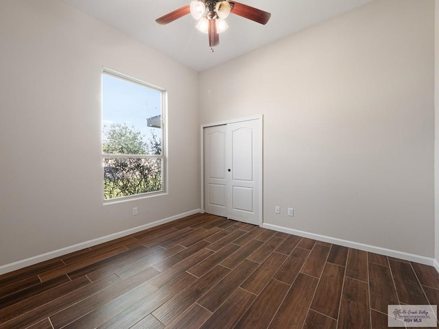 23756 Richmond Cir, Harlingen, TX 78552 - spare room featuring dark wood-style flooring and a ceiling fan