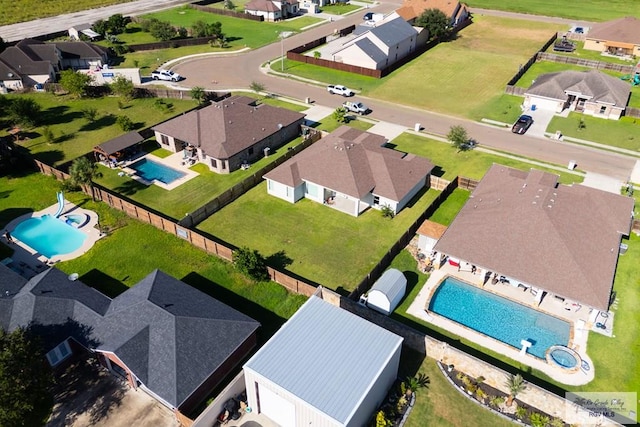 23756 Richmond Cir, Harlingen, TX 78552 - aerial view of property and surrounding area with a pool and nearby suburban area