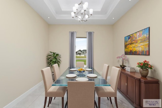 1902 Thacker Ln, Harlingen, TX 78552 - dining room with a chandelier and a raised ceiling