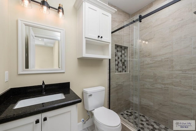 1902 Thacker Ln, Harlingen, TX 78552 - bathroom featuring vanity and a stall shower
