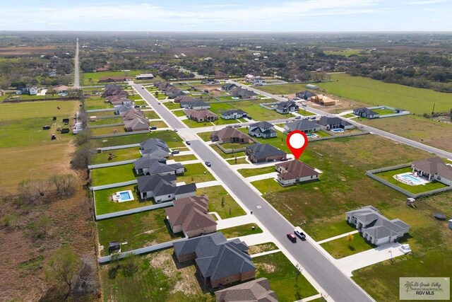 1902 Thacker Ln, Harlingen, TX 78552 - aerial view of property and surrounding area featuring nearby suburban area