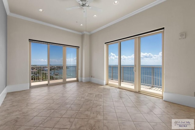 201 W Capricorn Dr, South Padre Island, TX 78597 - unfurnished room featuring a ceiling fan, crown molding, light tile patterned flooring, recessed lighting, and a water view